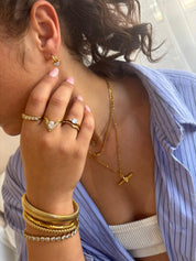 LINEAR LUXE BANGLE best gold plated tarnish and water resistant piece by Irish Jewellery brand - Lynott Jewellery