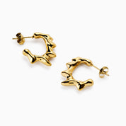 MOLTEN FLARE HOOP best gold plated tarnish and water resistant piece by Irish Jewellery brand - Lynott Jewellery