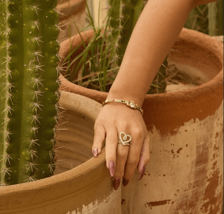 MEGAN FORTE CLARKE SIDE EYE CLADDAGH BANGLE best gold plated tarnish and water resistant piece by Irish Jewellery brand - Lynott Jewellery