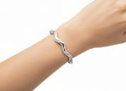 GLIMMER WAVE STRIKE BANGLE best gold plated tarnish and water resistant piece by Irish Jewellery brand - Lynott Jewellery
