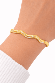 GLIMMER WAVE STRIKE BANGLE best gold plated tarnish and water resistant piece by Irish Jewellery brand - Lynott Jewellery