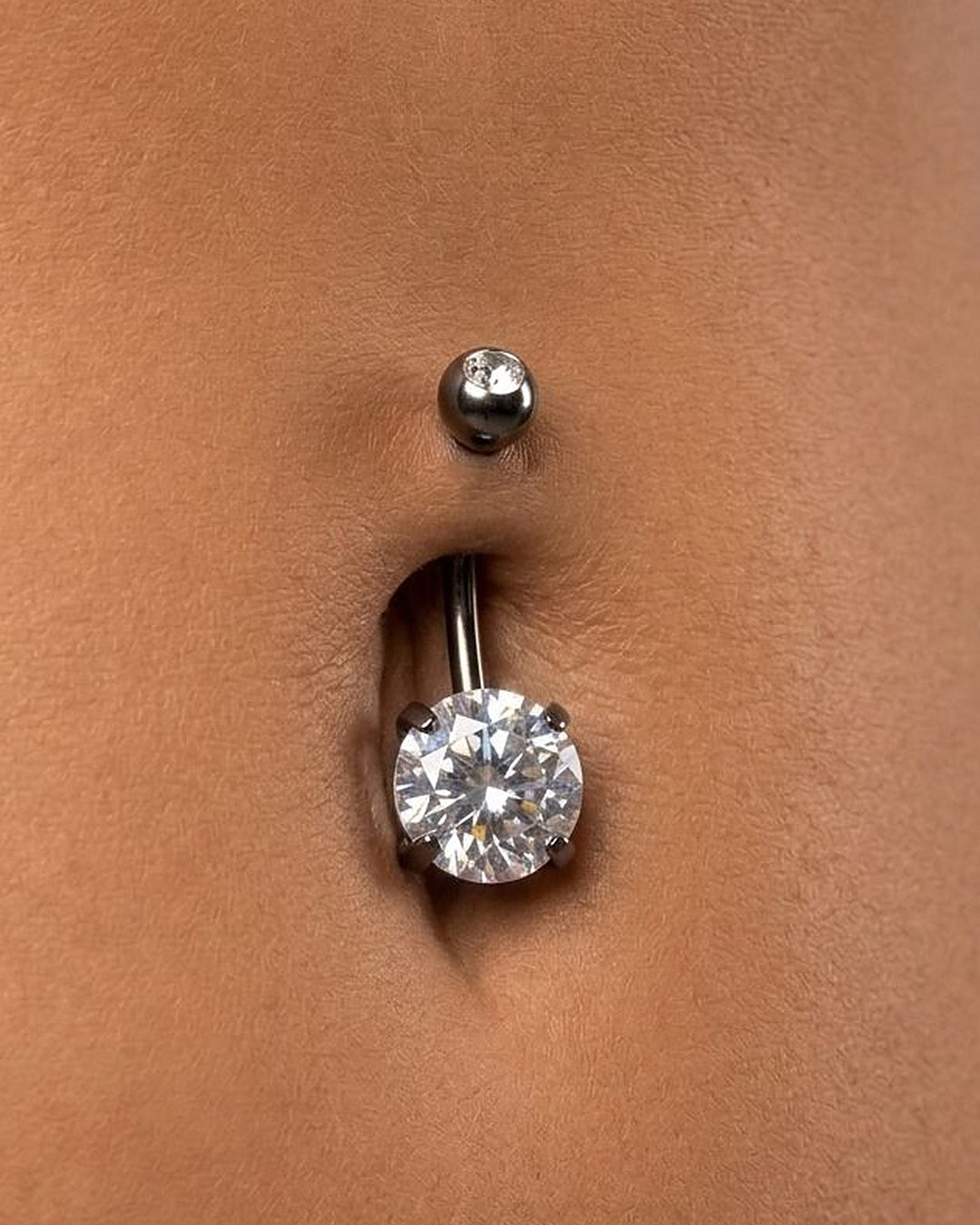 DISCO DOT BELLY BUTTON PIERCING