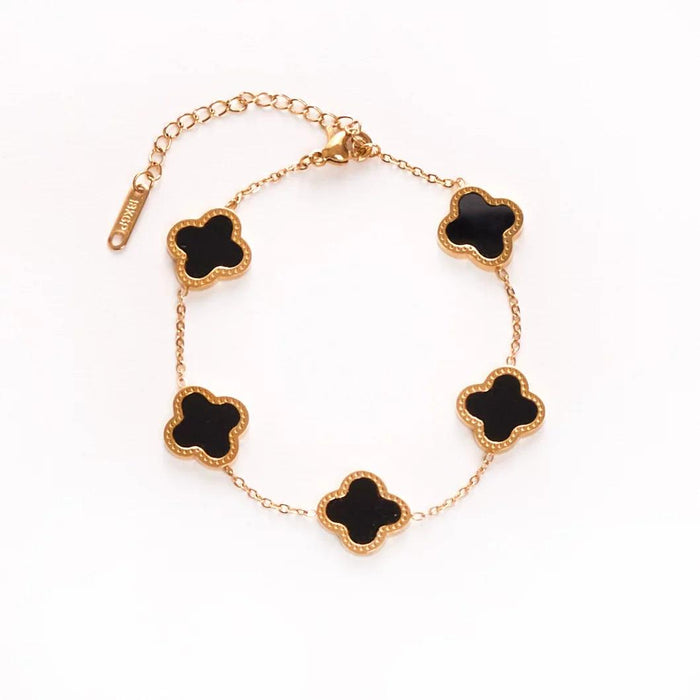 FOUR LEAF CLOVER BRACELET BLACK AND GOLD - Lynott Jewellery